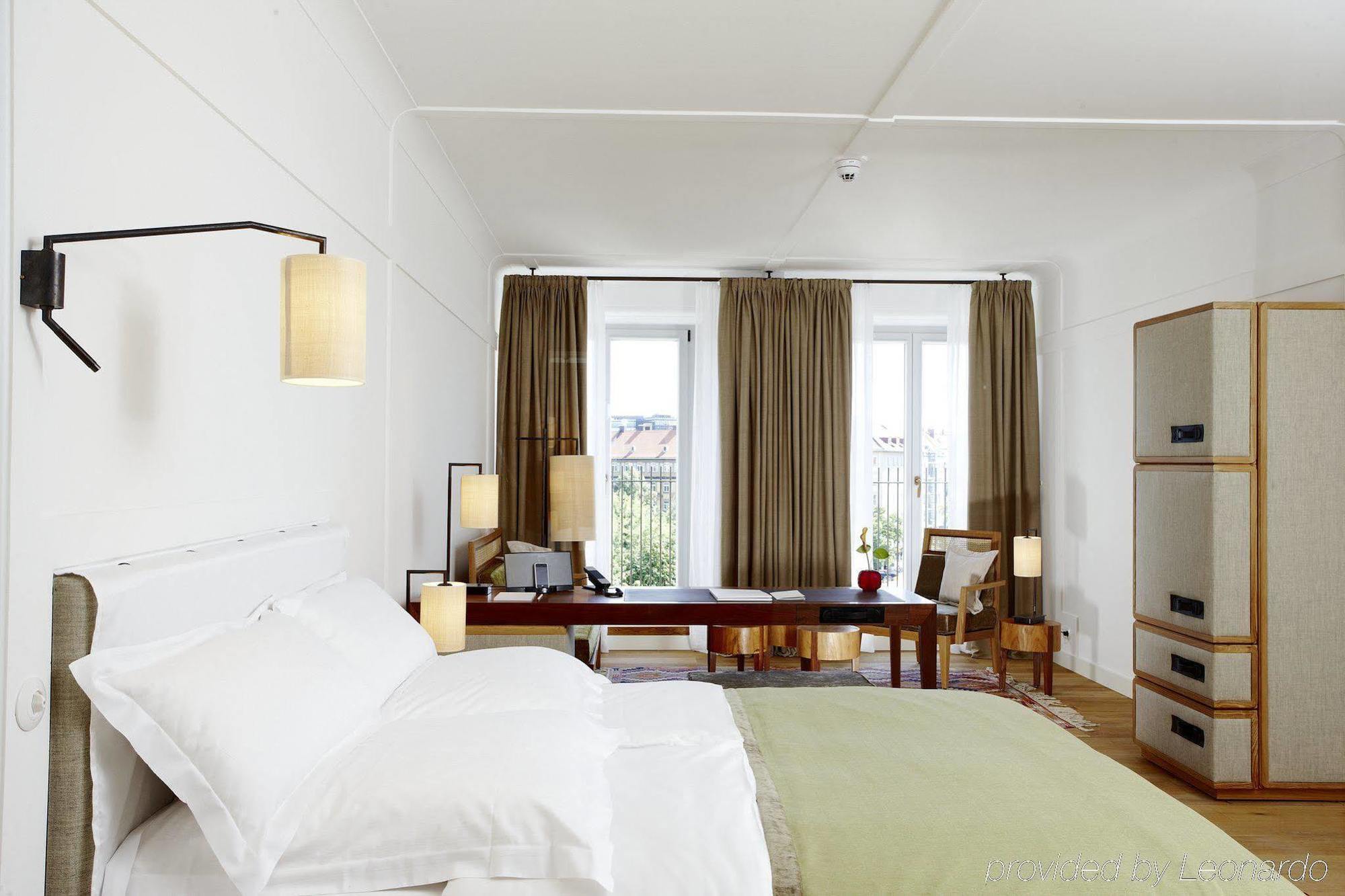 โรงแรมหลุยส์ มิวนิก ภายนอก รูปภาพ A room at the Hotel Lisboa